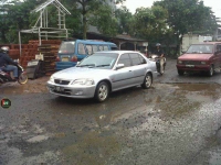  Lubang besar di Jalan Raya Pondok Cabe