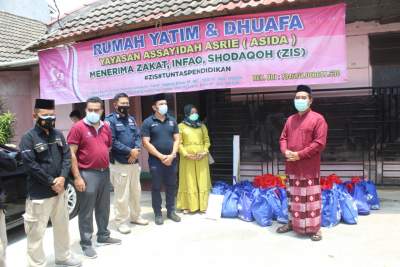 Polda Banten Bersama Komunitas PIC Salurkan Puluhan Paket Sembako dan Masker Kepada Anak-anak Yatim